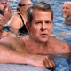 Illustration for article titled Brian Kemp Pushes Against Coronavirus Restrictions By Moving All Government Business To Packed Indoor Pool